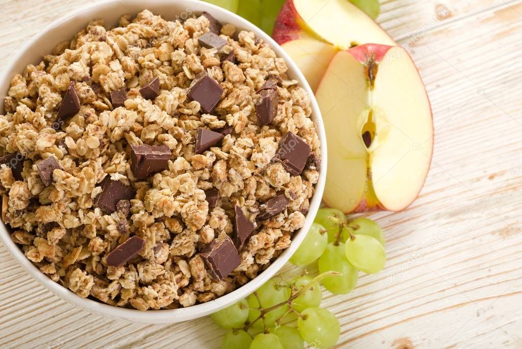 muesli chocolate on a wooden background