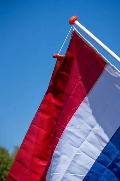 Primo piano di una bandiera nazionale olandese — Foto Stock