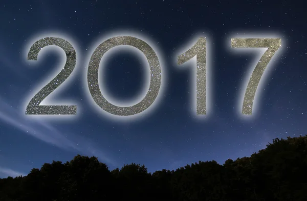 2017. Buntes Leuchten 2017 Neujahr. Nachthimmel. — Stockfoto