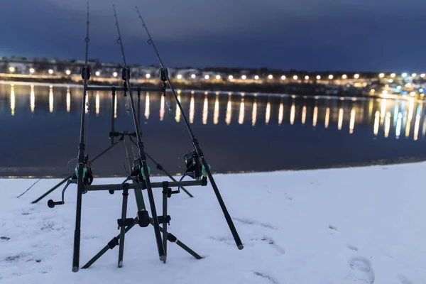 Carp spinning reel angling rods in winter night. Night Fishing — Stock Photo, Image