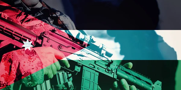 Soldier with machine gun with national flag of Jordan — Stock Photo, Image