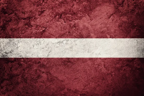 グランジ ラトビア フラグ。ラトビアの旗グランジ テクスチャ. — ストック写真