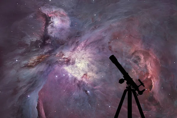 Space background with silhouette of telescope. The Orion Nebula — Stock Photo, Image