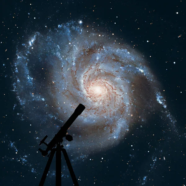 Space background with silhouette of telescope. Pinwheel Galaxy — Stock Photo, Image