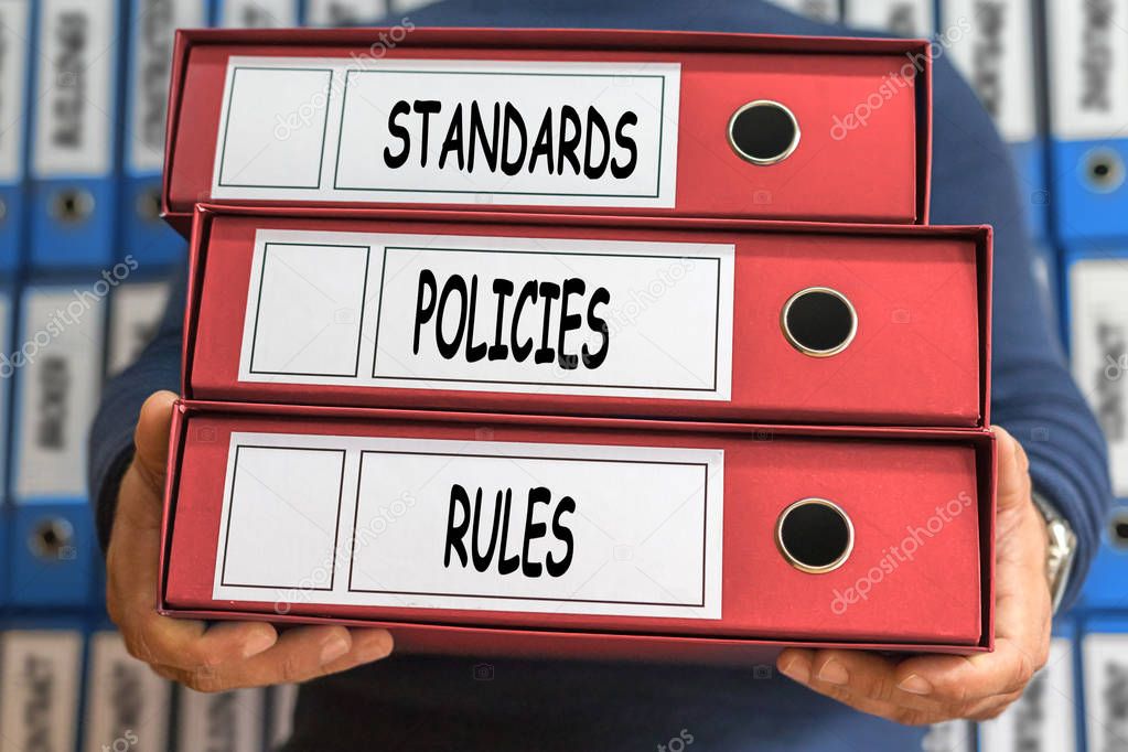 Standards, Policies, Rules, concept words. Folder concept. Ring 