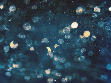 Soyut mavi Bokeh arka plan daireler. Mavi arka plan bulanık,