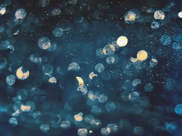 Soyut mavi Bokeh arka plan daireler. Mavi arka plan bulanık,