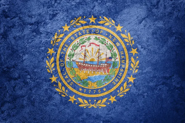 Grunge New Hampshire state flag. New Hampshire flag background grunge texture.