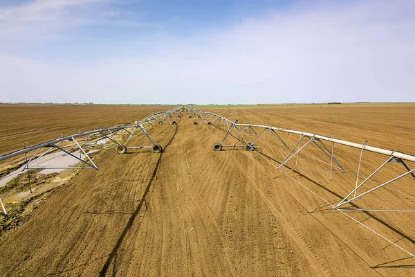 Center pivot irrigation system. Agricultural land, Aerial View.