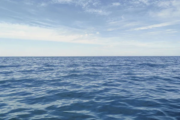 Blue Ocean, Water Surface a Blue Sky — Stock fotografie