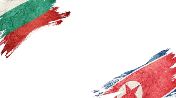 Прапори Болгарії та Північної Кореї на білому тлі — стокове фото