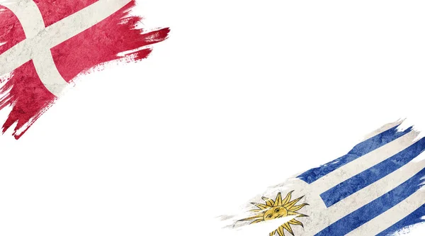 Danmarks och Uruguays flaggor på vit bakgrund — Stockfoto