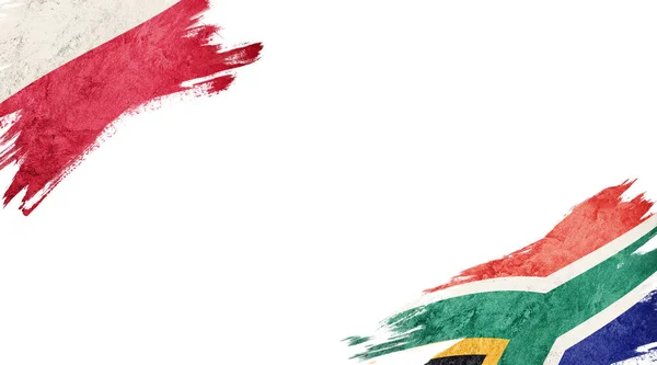 Drapeaux de la Pologne et de l'Afrique du Sud sur fond blanc — Photo
