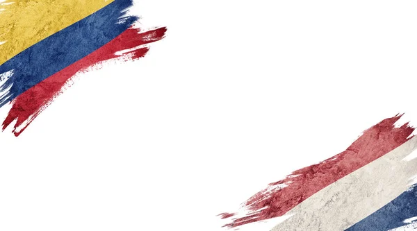 白色背景的哥伦比亚和荷兰国旗 — 图库照片
