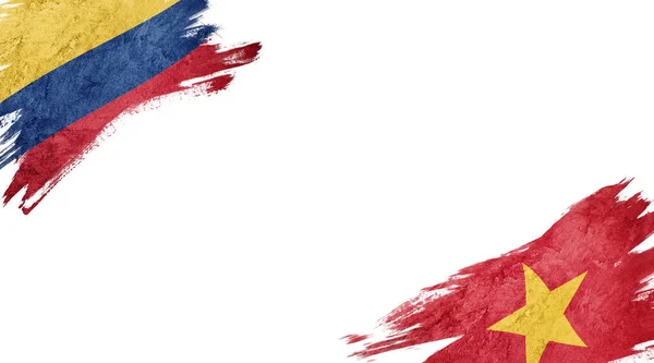Vlajky Kolumbie a Vietnamu na bílém pozadí — Stock fotografie
