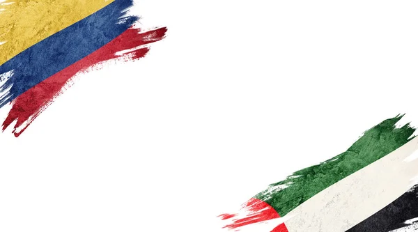 Прапори Колумбії та Уе на білому тлі — стокове фото