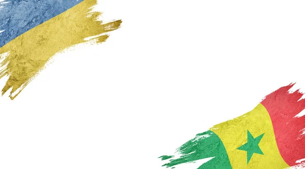 Flags of Ukraine and Senegal on white background — 스톡 사진