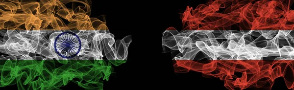 Flags of India and Austria on Black background, India vs Austria Smoke Flag