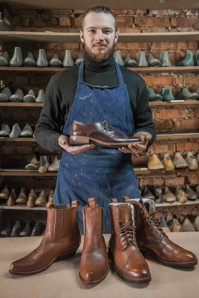 Male shoe maker working