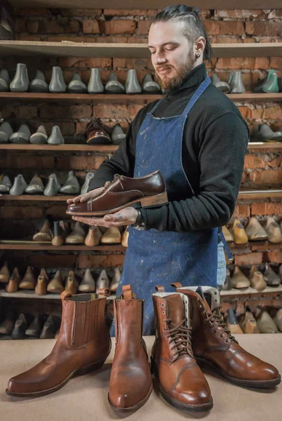 Male shoe maker working