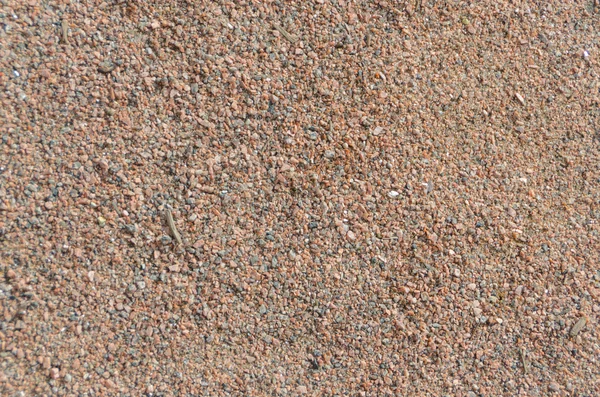 A textura da areia colorida pequenas pedras closeup — Fotografia de Stock