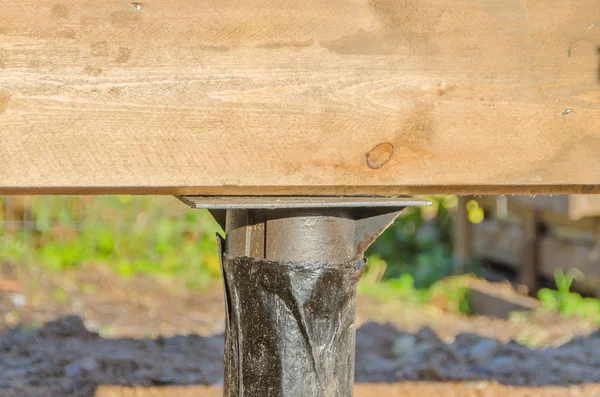 Closeup on the basis of pile Foundation Board framing of a house — Stock Photo, Image