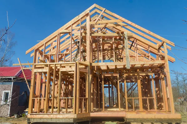Construction of wooden frame house Stock Photo by ©P-KDmitry 192192776