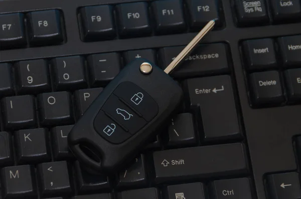 car keys on the keyboard