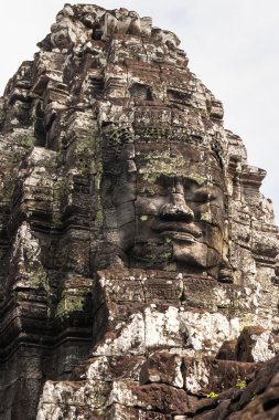 Kule Angkor Wat, Kamboçya ve dünyanın en büyük dini anıt karmaşık Tapınağı yüzleri ile. UNESCO Dünya Miras Listesi.