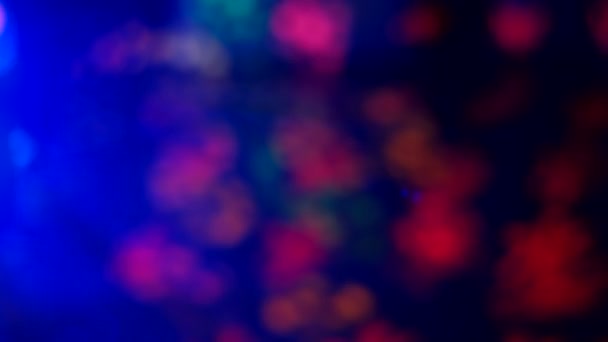 Defocused night club lights, blurred colorful bokeh background. — Stock Video