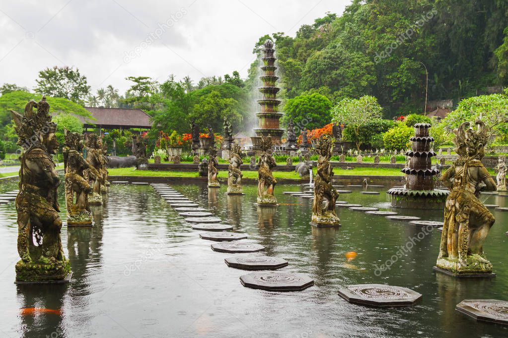 Water Palace of Tirta Gangga. Landmark in Bali, Karangasem, Indonesia. Winter rainy season.