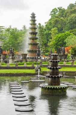 Water Palace of Tirta Gangga. Landmark in Bali, Karangasem, Indonesia. Winter rainy season. clipart