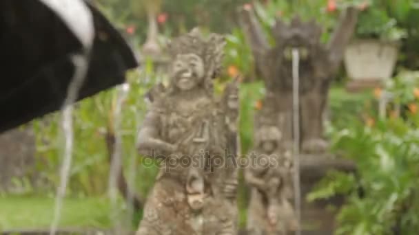 Water Palace of Tirta Gangga. Landmark in Bali Karangasem Indonesia. Winter rainy season. — Stock Video