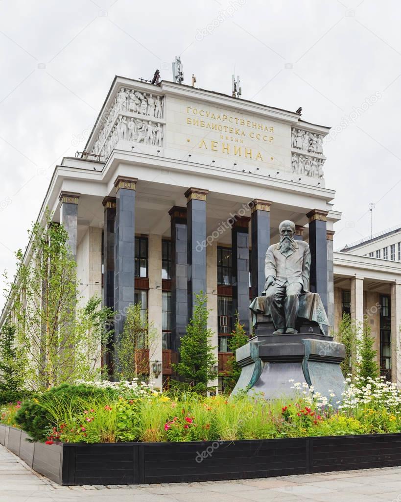 Monument to famous russian writer Dostoevsky F.M. in front of Russian State Library. Moscow, Russia.