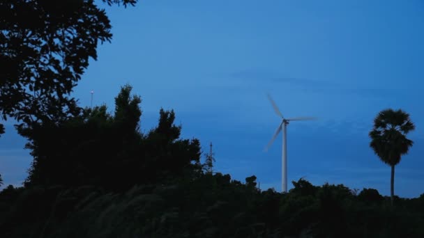 Working wind engine. Dusk at Windmill viewpoint. Phuket island, Thailand. — Stock Video