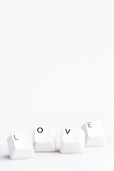 Λέξη αγάπη στα κουμπιά του πληκτρολογίου του υπολογιστή. Μπορεί να χρησιμοποιηθεί ως σύμβολο της αγάπης στο Διαδίκτυο, ηλεκτρονικό ταχυδρομείο επιστολές αγάπης. — Φωτογραφία Αρχείου