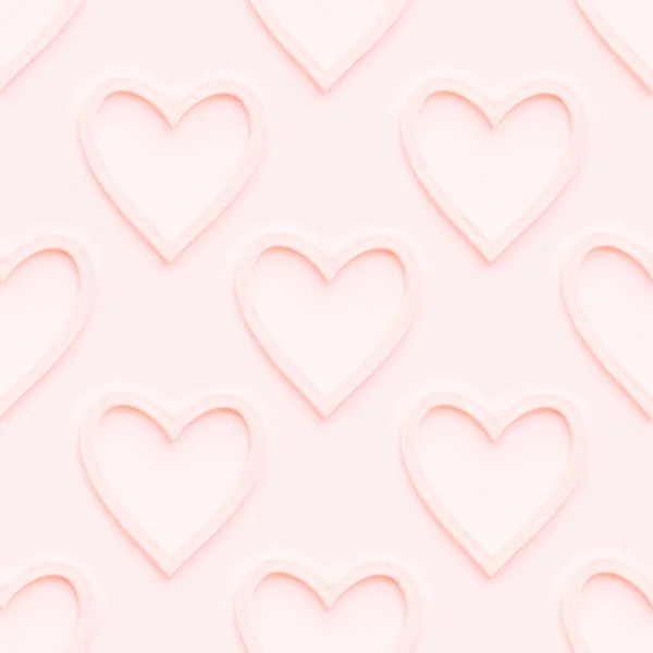 Seamless pattern with decorative coral colored hearts. Christmas or Valentine's Day decorations on pink background. Symbol of love, photo pattern. — Stock Photo, Image