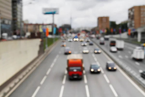 Auto sfocate nel traffico cittadino come sfondo — Foto Stock