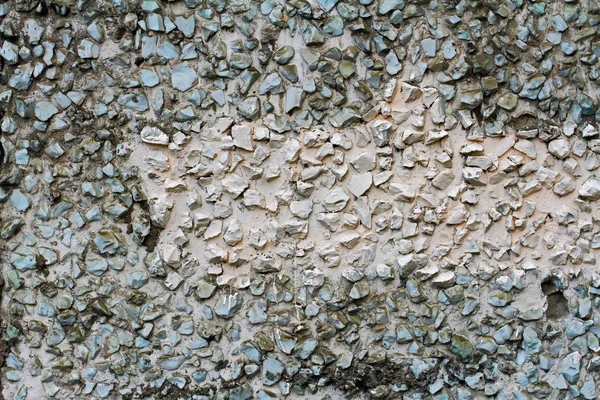 Wand aus kleinen Steinen als Hintergrund, Textur — Stockfoto