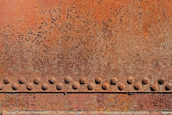 Mur en fer rouillé avec rivets — Photo