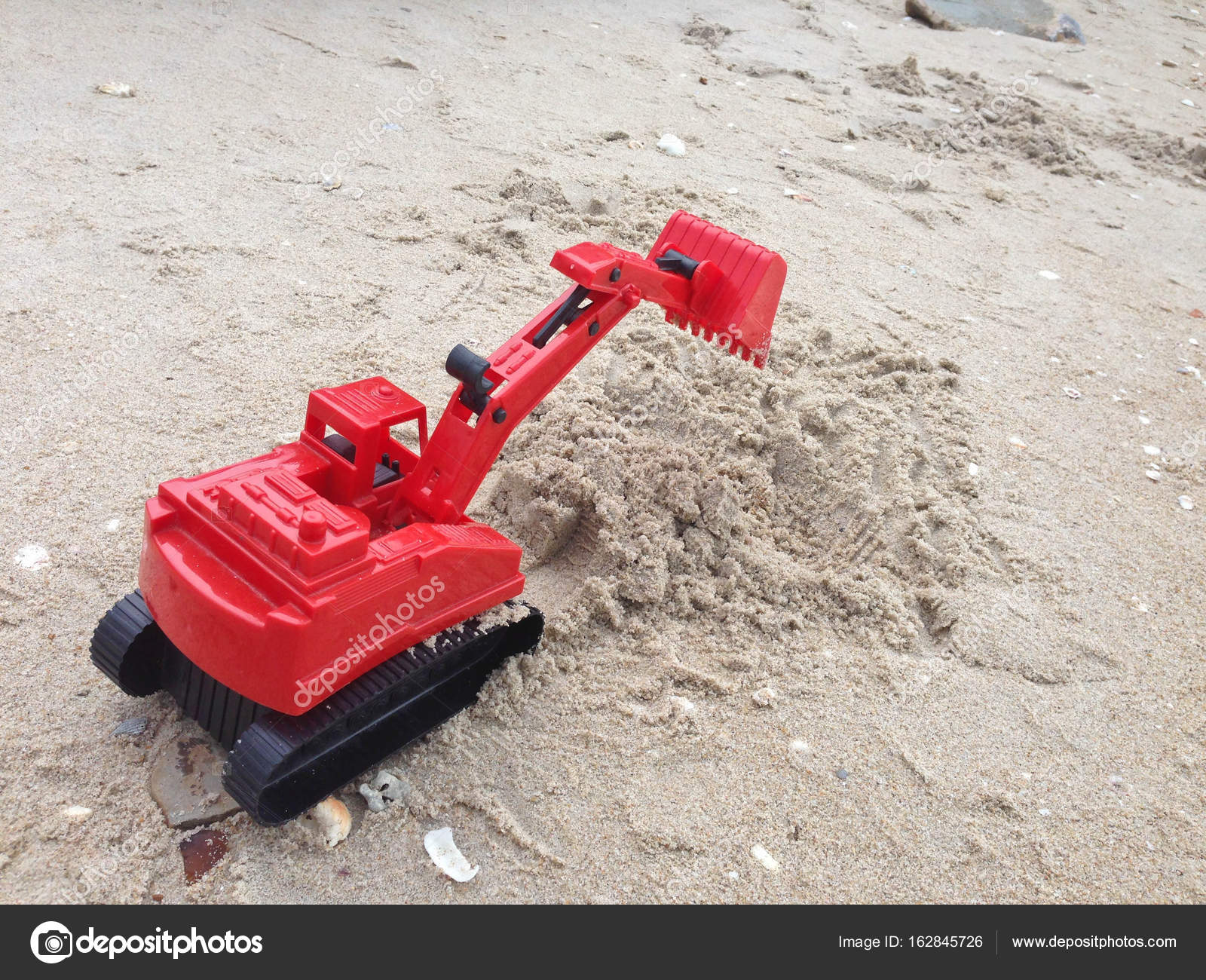 red excavator toy