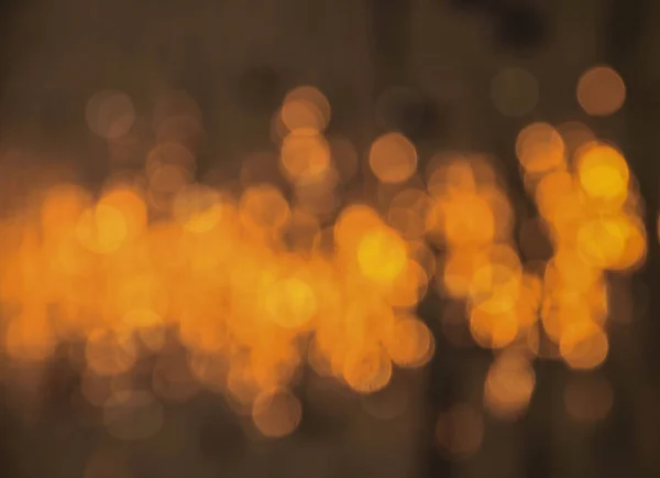 abstract background gold bokeh circles. Beautiful background with particles.