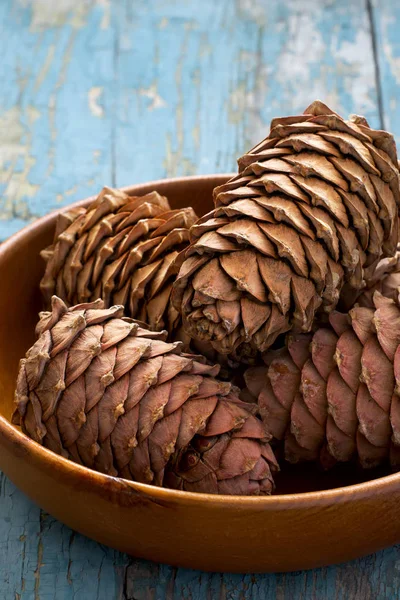 Cedar cones with pine nuts in a bowl