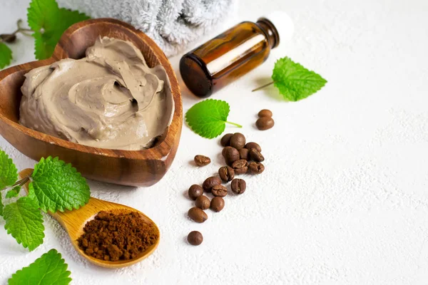 Cosmetic face mask and body made  clay, mint leaves Coffee beans