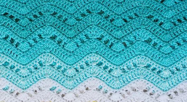 Crocheted multicolored cotton fabric In Turquoise colors. Stripe