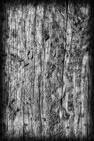 Oude geknoopte hout, verweerde gerot gebarsten gebleekt en gebeitst donkergrijs Vignetted Grunge textuur — Stockfoto