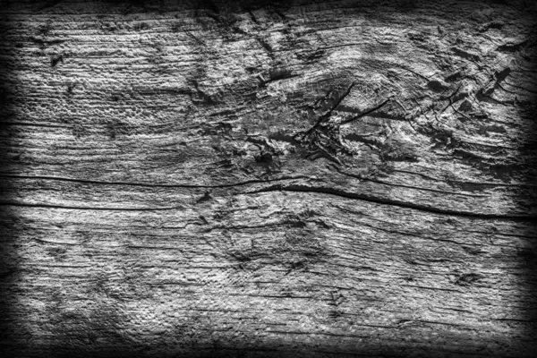 老打结的木材腐烂风化破碎漂白和染色的深灰色渐晕光 Grunge 纹理 — 图库照片