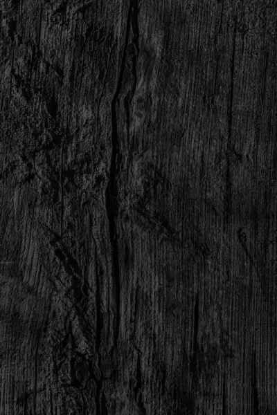 Gamla knutna trä vittrade ruttna knäckt blekta och missfärgade träkol svart Grunge konsistens — Stockfoto
