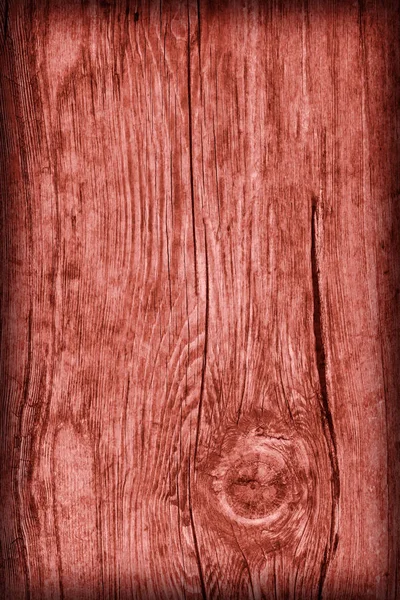 Old Knotted Wood Weathered Rotten Cracked Bleached And Stained Maroon Red Vignetted Grunge Texture — Stock Photo, Image