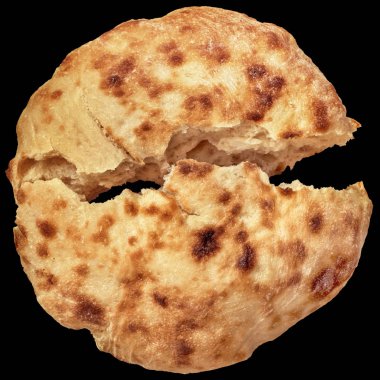 Leavened Loaf of Flatbread Torn In Half Isolated on Black Background clipart